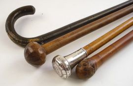 A Continental silver mounted walking cane:, together with a Chinese cane,