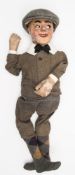 An Archie Andrews type ventriloquist's doll:,