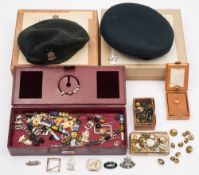 A collection of various military and Police buttons and badges:,