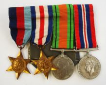 A WWII group of four:, unnamed, 1939-45 Star, France and Germany Star,