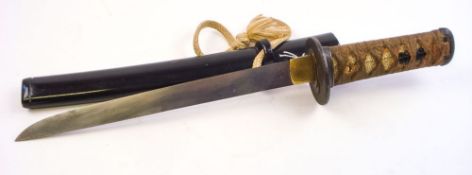 A Japanese tanto:, unsigned, the 10 1/2 inch blade over a copper habaki and iron tsuba,