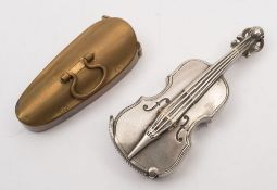 An early 20th century silver plated vesta in the form a violin together with a brass violin case