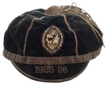 An early 20th century black felt and gold-braided sports cap:,