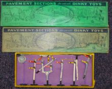 Two sets of Dinky Pavement Section No 46, together with a set of No 15 Dinky Railway signal:,