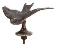An early 20th century silver plated car mascot in the form of a Swift:, unsigned,