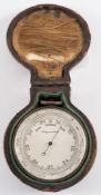 A double sided compensated pocket barometer:, vernier gauge to one side,