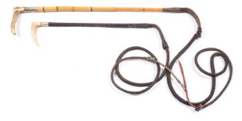 A silver mounted antler handled hunting whip,