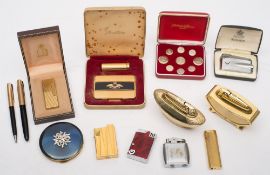 A gilt Dunhill lighter together with six various Ronson lighters:, also a Bluebird lighter,