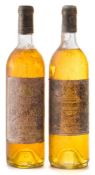 A bottle of Ch. Coutet Barsak Premier Cru 1979, and a bottle of Ch.