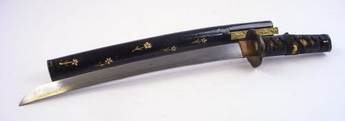 A Japanese wakizashi:, signed to the tang,