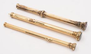 A yellow metal seal top combination propelling pencil and pen by Buttler & Co, London:,