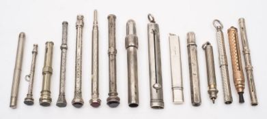 A collection of Edwardian and later silver and silver plated propelling pencils and holders