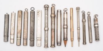 A collection of Edwardian and later silver and silver plated propelling pencils and holders