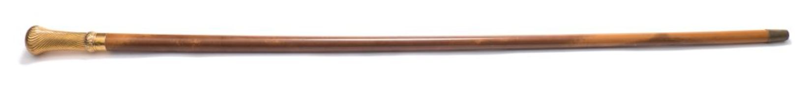 A 19th century yellow metal mounted walking cane:,