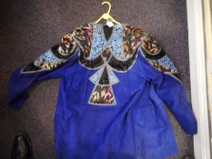 Roberto Cavalli (1940-) a two piece blue suede trouser suit:, of small size,