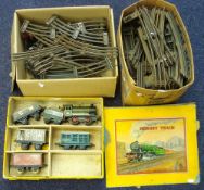 A Hornby 0-4-0 GWR clockwork locomotive and tender:, together with two GWR wagons,