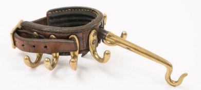A 19th century brass and leather 'Securem' patent campaign coat hanger:,
