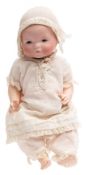 An Armand Marseille bisque head baby doll:, numbered 341/0K,