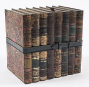 A Huntley and Palmers biscuit tin in the form of eight bound books:, 16cm wide.