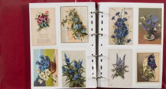 An album containing Edwardian and later postcards: illustrated with roses, flowers, still life etc.