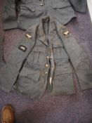 Two WWII RAF OA pattern jackets and a pair of RAF trousers in a kit bag:.