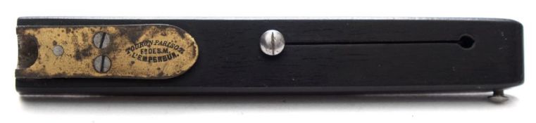 A 19th Century ebony and brass quill cutter by Tourun, Paris:.