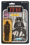 A Star Wars 'Return Of The Jedi' 3 /3/4 inch figure by Kenner, 'Darth Vader':, on 77 card back,
