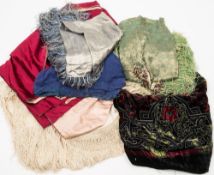 An early 20th century cream silk shawl:, together with a blue silk and silvered thread shawl,