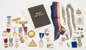 A collection of various Masonic jewels and regalia:,