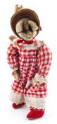 A mid-20th century anthropomorphic cat doll in gingham dress:, 52cm high.