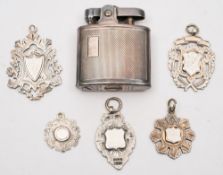 Five various silver fob medals and a Ronson petrol lighter:.