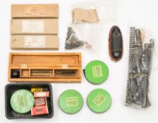 Three LEM .25 calibre bullet moulds: together with a collection of springs, pellets and accessories.