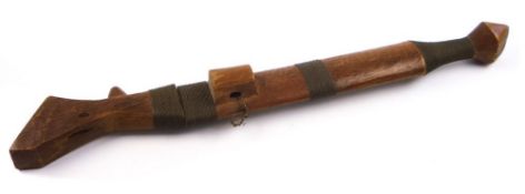 An African iron headed spear together with a wooden sheathed knife:, length of spear 148cm long.