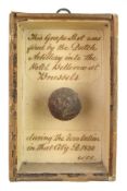 A mounted piece of grapeshot from The Belgian Revolution 1830:,