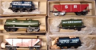 Four BRR Tinplate tanker wagons: together with two gravel wagons in original boxes.