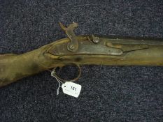 An early 19th century four bore percussion cap converted fowling gun:,