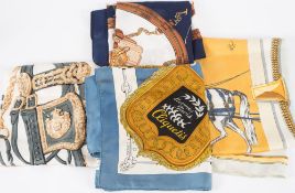 Four Hermes silk scarves:, 'Cliquetis', 'Brides de Gala', 'Jean de Bahrein' and 'Grand Apparat'.