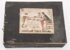 An early 20th century tin plate clockwork 'Miniature Table Railway' by Bing, Germany:,