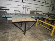 Packing Table with 10ft Hydrol Roller conveyor and two work surface with plywood tops on casters,