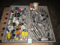 One tot of two trays of misc. pneumatic cylinders, stop switches, etc. (Located in Iowa)**EUSA**