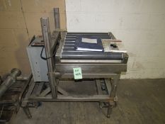 Stainless Steel Chekweigher on Roller Conveyor with Sensotec Programmable Controller on base and