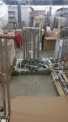 4 Pallets Clothing racks and product displays Rigging Cost: $40