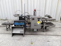 Pearson Case Sealer, Model # N401, S/N 9904019091, high speed top case sealer with Nordson hot