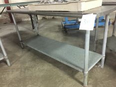 Stainless Steel Table with SS Legs and galvanized steel base shelving. Rounded edges on the length
