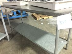 Stainless Steel Table with SS Legs and galvanized steel base shelving. Rounded edges on the length