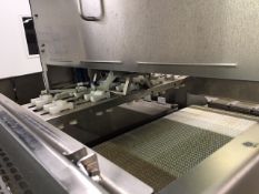 2012 Multivac H050. Has a 2 axis robotic arm w/ 2 position vacuum gripper. Automates pack separation