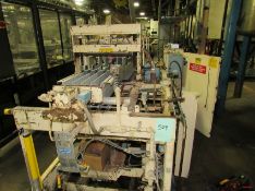 Miller Drop Case Packer with safety curtain. Removal and loading $450.0 Located in Iowa