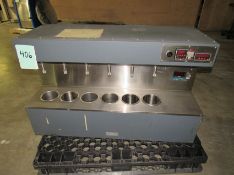 Terg-Otomerer Six Chamber Soap tester with temperature and speed controllers. Removal and loading