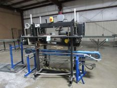 Lid Closer by Packaging Automation Corp. Packing System --Span-Tech Motorized Conveyor on bottom and