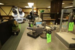 Meiji and Swift Stereo Microscopes, Mounted on Adjustable Booms